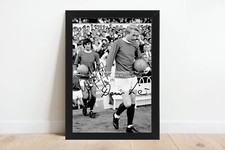 DENIS LAW GEORGE FOTO FIRMATA