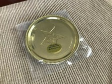 American Girl oro stella logo