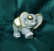 THUN ® 2018 ELEFANTE ELLY MEDIO GRIGIO IN CAMMINO MARGHERITA SUL DORSO NO BOX