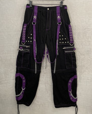 Pantaloni gotici donna Tripp NYC neri geometrici tasche medie fibbie zip bottone