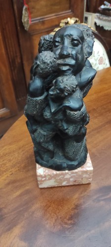 Scultura legno ebano - in,