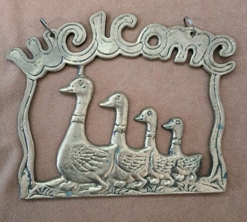 Brass geese family welcome - family,