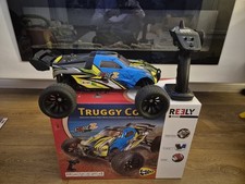 Reely CORE Z Brushed RC auto modellino auto elettrico Truggy 1:10 XS come nuovo imballo originale