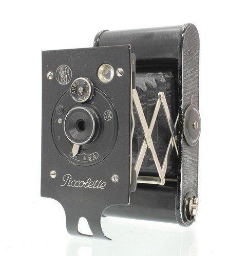Macchina fotografica - , a