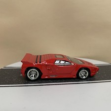 Hot Wheels Boulevard Ahead Of Its Time Vector W8 Twin Turbo Rosso con RR 1:64 NM