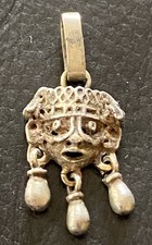 Antica maschera ciondolo in