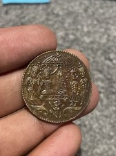 Moneta gettone antico tempio