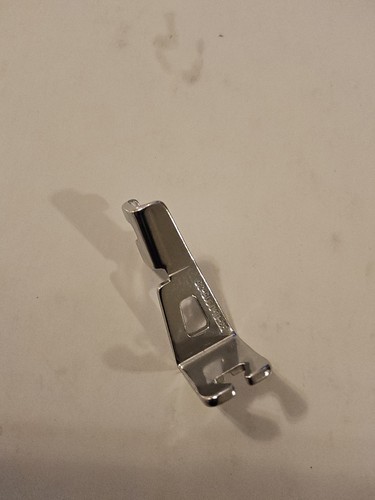 Piedino pressa per