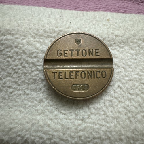 Gettone telefonico 7702 - gettone,