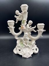 Candelabro porta candela tre lume porcellana Capodimonte angeli putti fiori