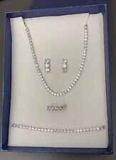 collana tennis + bracciale + orecchini + anello . idea regalo