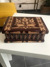 Scatola in legno con apertura segreta