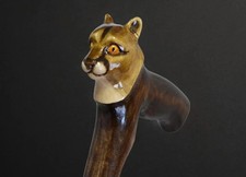 Hand carved wooden puma handle