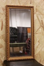 Specchiera dorata di forma