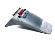 PARAFANGO PORTATARGA POSTERIORE HONDA CHIOCCIOLA 125-150 2000-2006 ORIGINALE