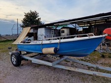 barca di 4 mt con motore fuori bordo da 15cv