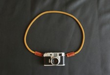 Cinturino per fotocamera in