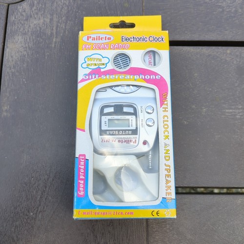 Electronic clock scan radio - clock, fm