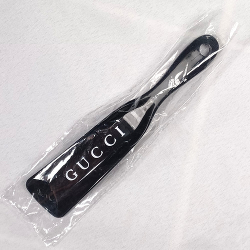 Gucci shoe horn designer - gucci,