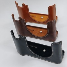 Custodia mezza fotocamera in