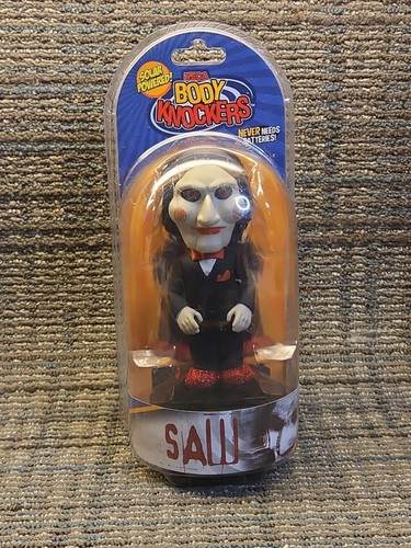 Neca saw body knocker - knocker, ad