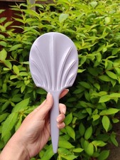 A vintage pastel purple Halex