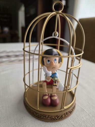 Disney pinocchio statuina oro - pinocchio,
