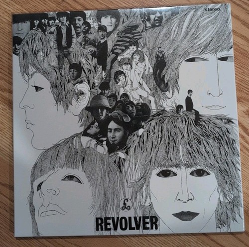 Beatles revolver includes a - (includes,