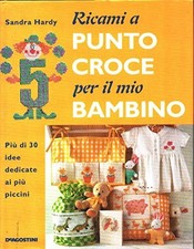 Ricami a punto croce per il