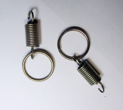 Coppia molle fissaggio faro - molle,