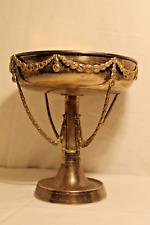 Alzatina in metallo e ottone decorata con motivi floreali a drappi