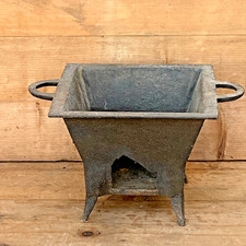 ANTICO BRACIERE IN GHISA primi