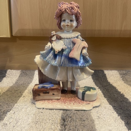 Statuina bambola porcellana
