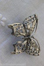 FARFALLA IN METALLO ARGENTATO GR 9 / BOMBONIERA