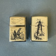 Lotto 2 Zippo Scrimshaw – Ducks 2005 + Lighthouse 2003 Originali USA
