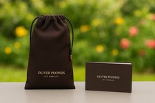 Oliver Peoples – Sacchetto originale con libretto | Nuovo – 17x10 cm In vendita