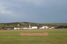 PHOTO  LANDS END AERODROME FROM HERE THERE ARE REGULAR FLIGHTS TO AND FROM SCILL