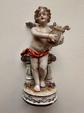 Antica statuina porcellana