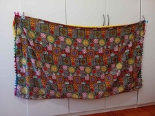 pareo che dall'altro lato è asciugamano giallo