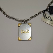 Collana con ciondolo - , etichetta