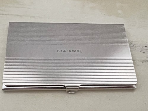 Dior homme porta - dior, biglietti