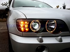 FARI ANGEL EYES NERI CON FRECCE   LED BMW X5 E53 DAL 5/2000 AL 11/2003+MOTORINI