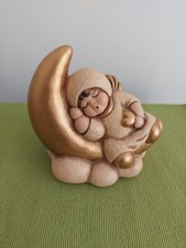 THUN: ANGELO SU NUVOLA SDRAIATO SU LUNA CON CUORE IN MANO