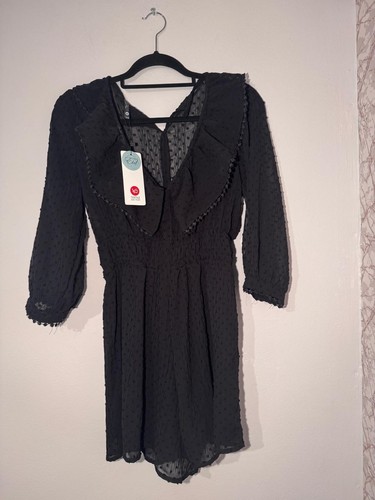 Elegante tuta nera manica