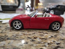 Maisto 2006 Pontiac Solstice 1:24 Scale Diecast Model Car Red Loose Damaged 