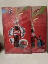 2 laste quadri coca cola