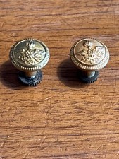 Pair gold shoulder buttons - of,