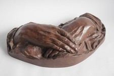 Cera persa bronzo mani