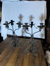 Antichi candelieri in ferro battuto del 1800