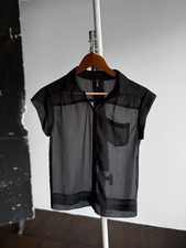 Camicia blusa smanicata